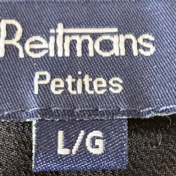 Elegant Black Ruffle Sleeveless Top - Picture 2 of 6